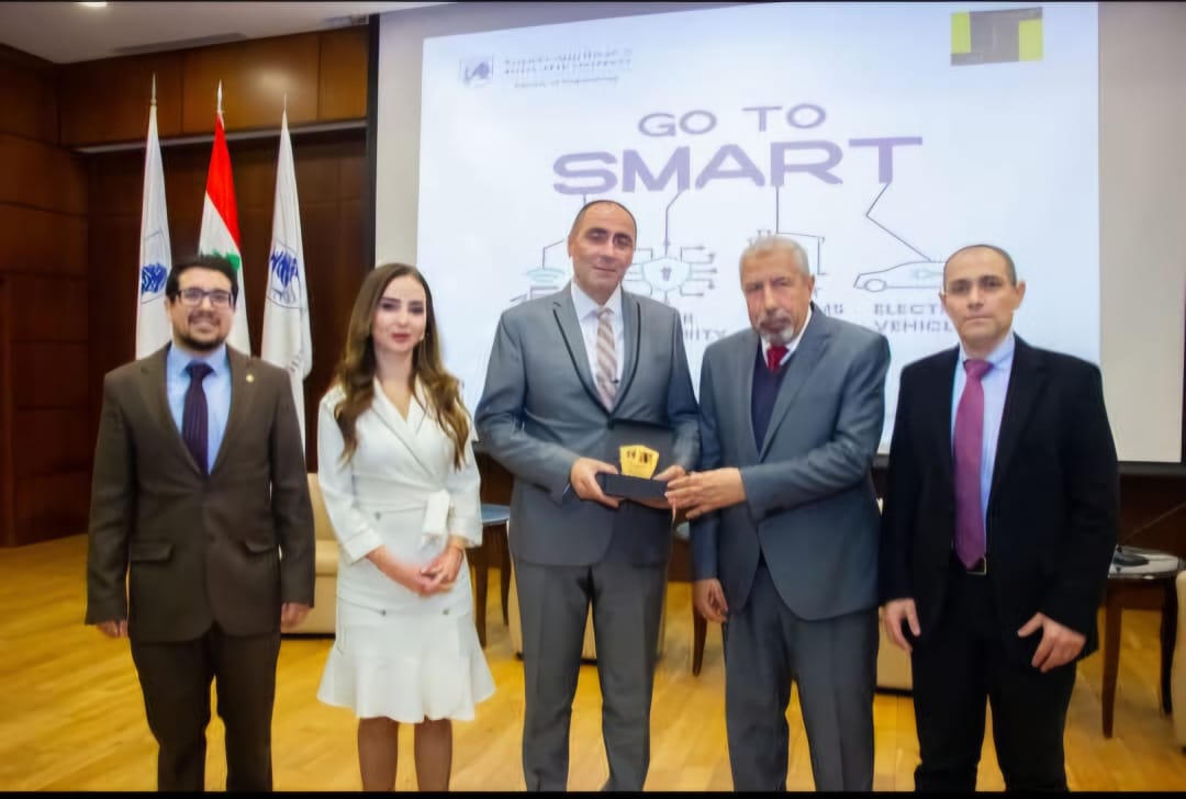 Dr. Khatib with team receiving collaborative engineering achievement award