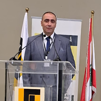 Dr. Milad Khatib speaking at professional conference